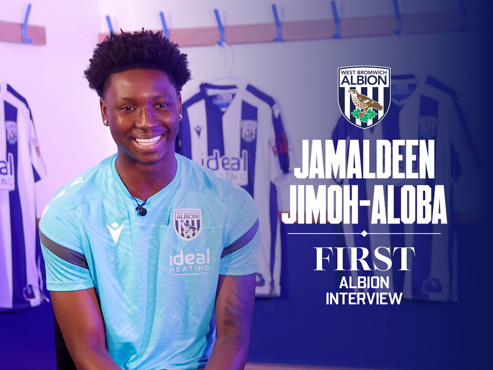 Jamaldeen Jimoh-Aloba smiling while being interviewed by WBA TV with the words 'Jamaldeen Jimoh-Aloba, the first Albion interview' written on