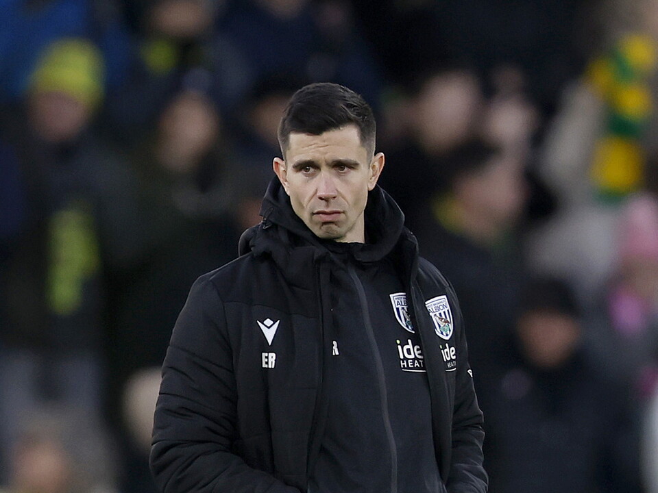 Eric Ramsay in a black WBA coat 