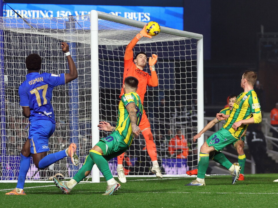 A photo of goalkeeper Max O'Leary making a save against Birmingham City