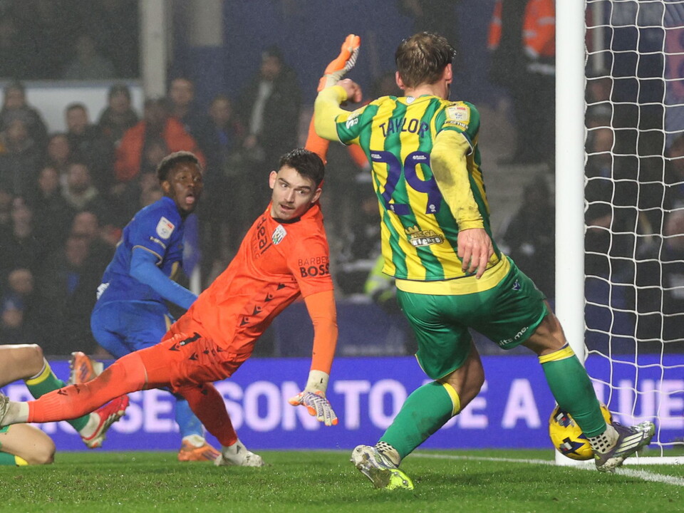 Charlie Taylor makes a goal-line clearance against Birmingham