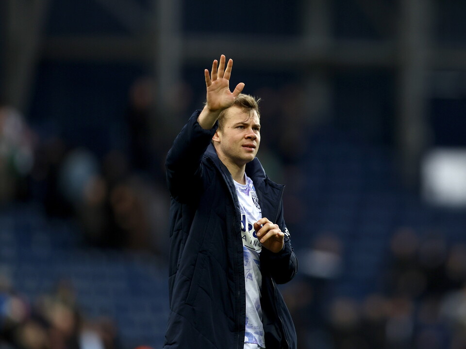 Aune Heggebø waving to WBA fans after the win over Hull