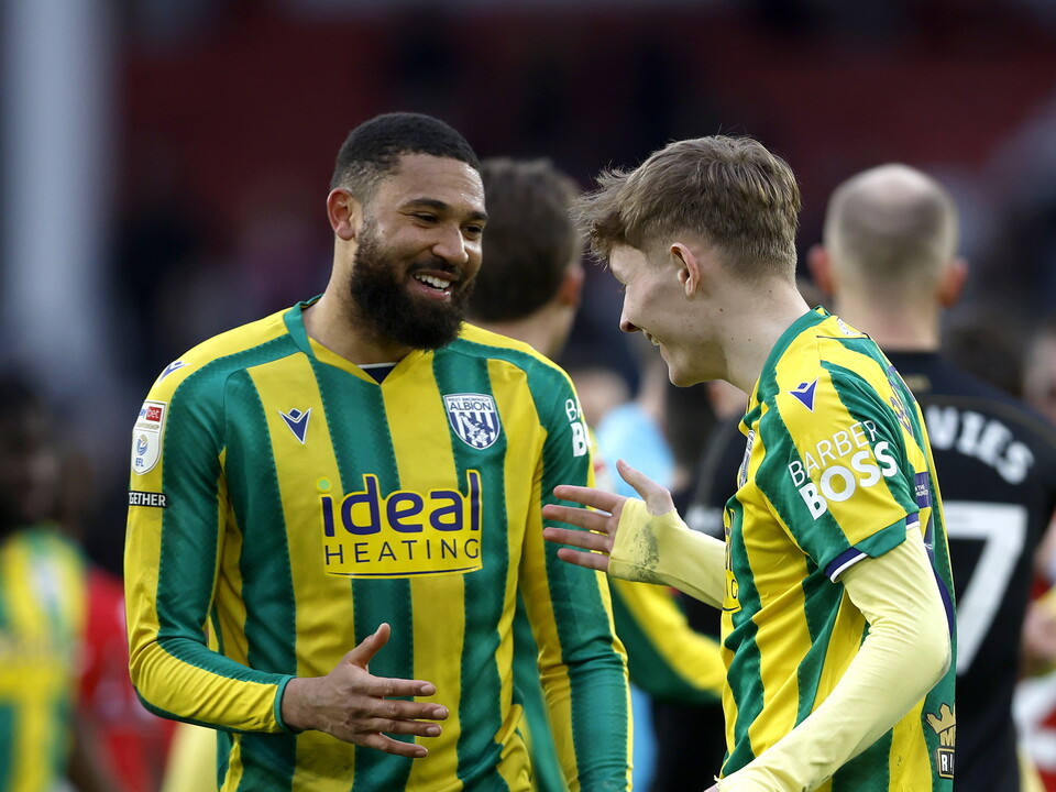 George Campbell and Ollie Bostock smiling and talking after the Sheffield United game 