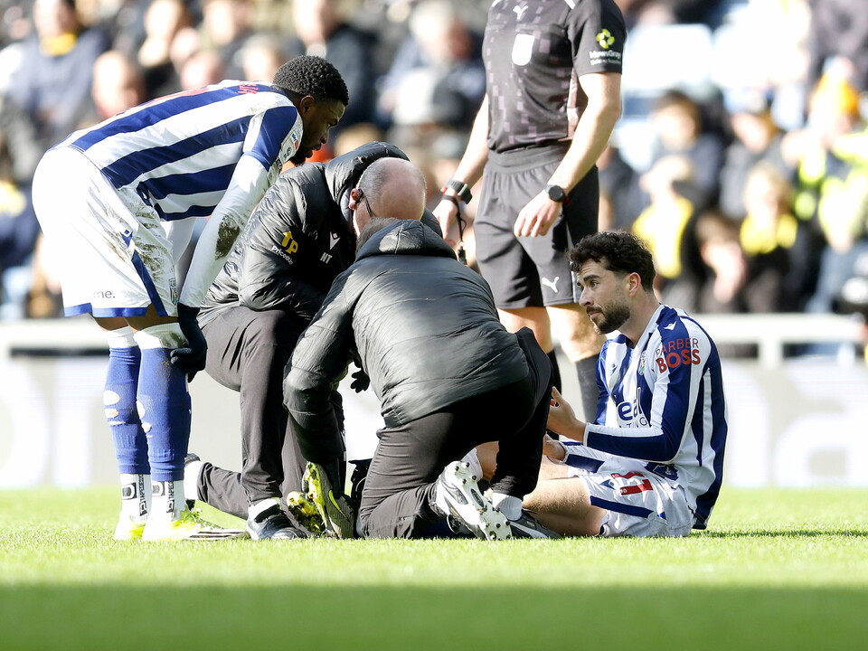 An image of Mikey Johnston following his injury against Oxford