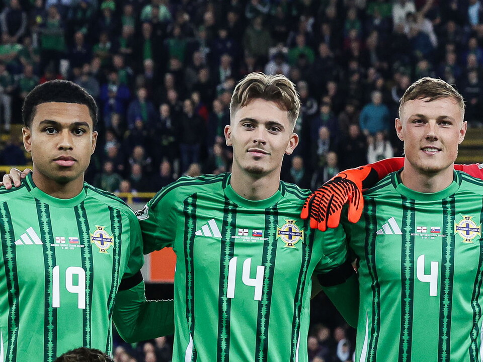 Isaac Price lining up for a team photo with Northern Ireland 