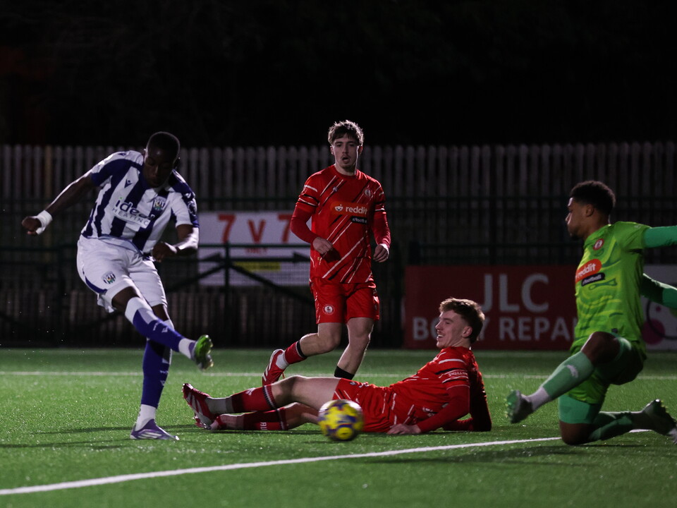 An image of Esoesa Sule scoring against Redditch