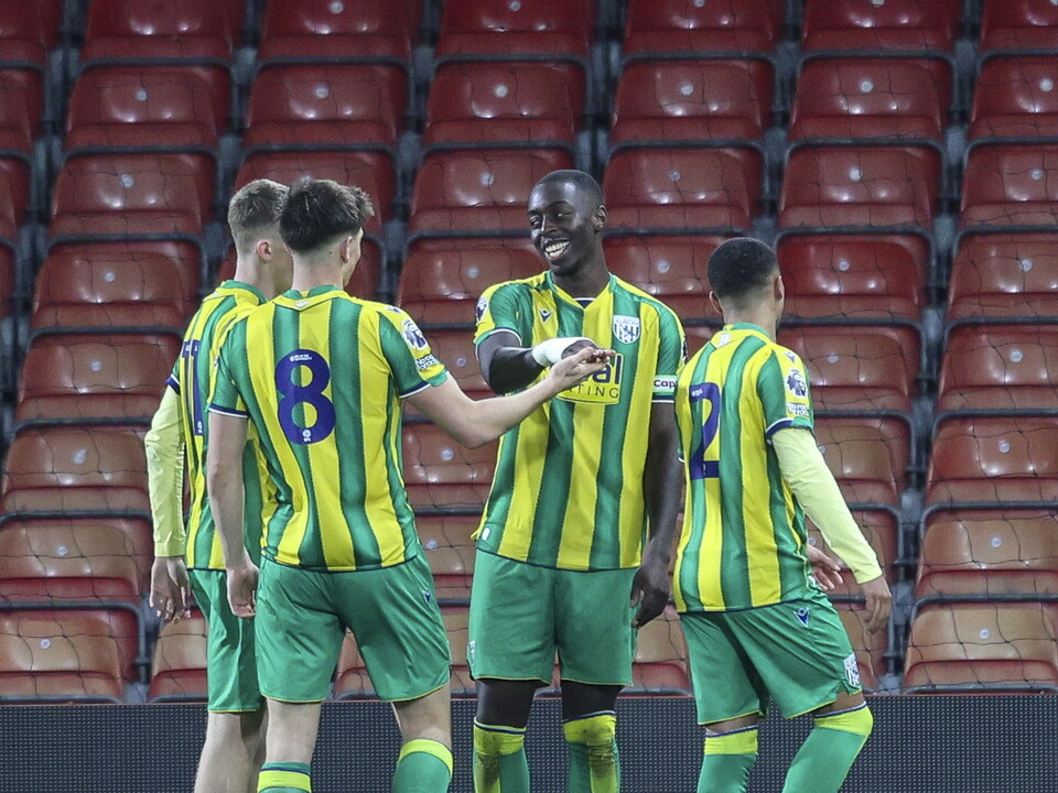 Eseosa Sule celebrates with team-mates after scoring against AFC Bournemouth in the Premier League Cup 