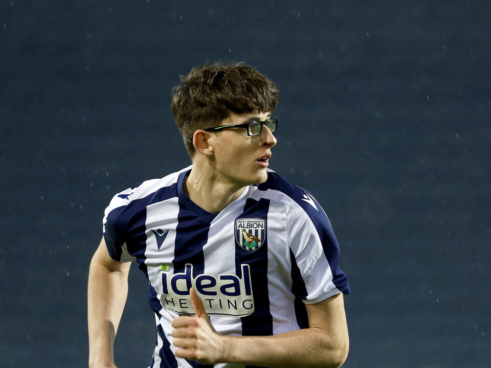 Cole Dexter in action for WBA in the home kit 