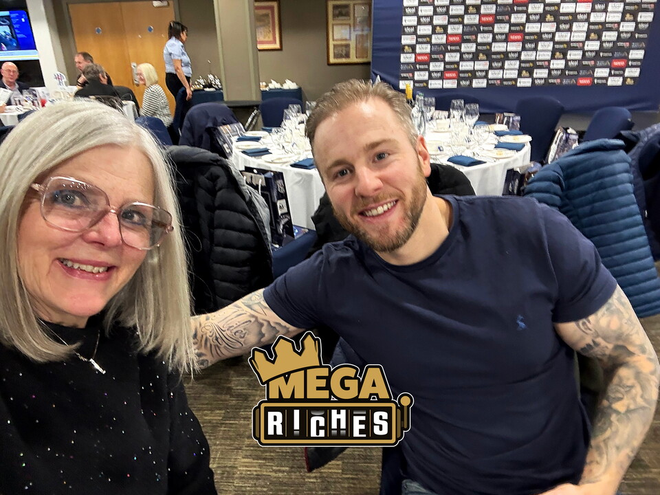 Cheryl and son seating in The Richardson Suite