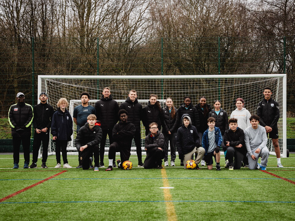 Group photo of participants and referees
