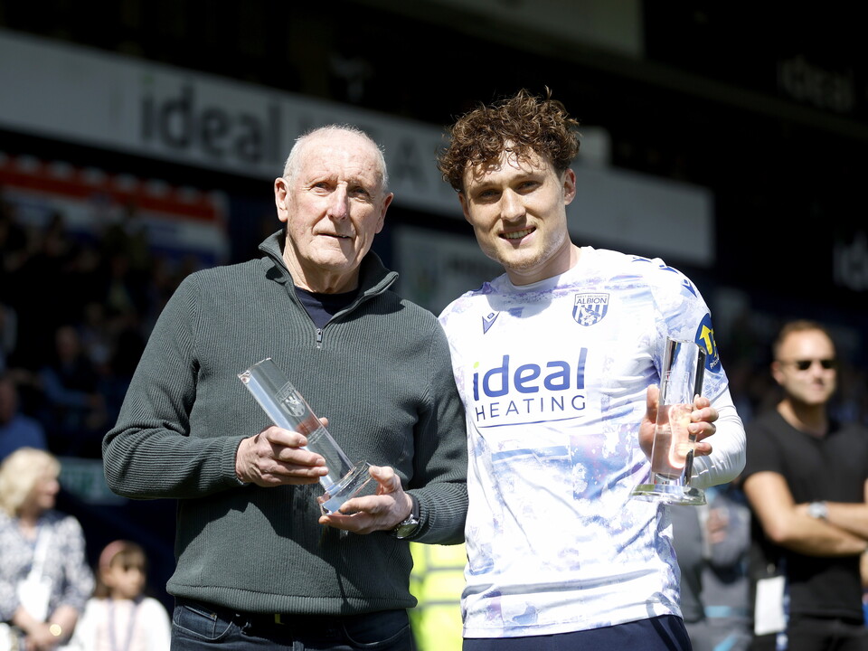 An image of Callum Styles with his supporters' player and players' player of the season trophies