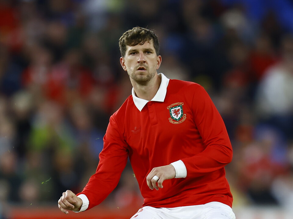 Chris Mepham in action for Wales.