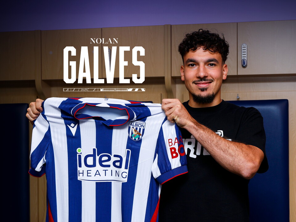 An image of Nolan Galves holding up an Albion shirt