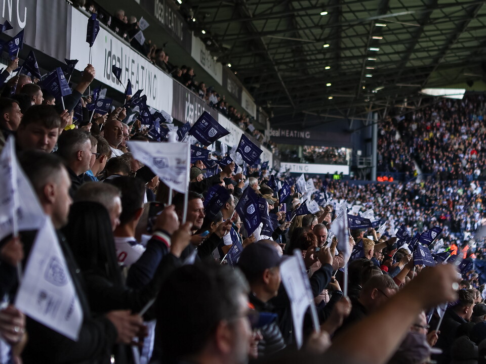 An image of Albion supporters in the West Stand