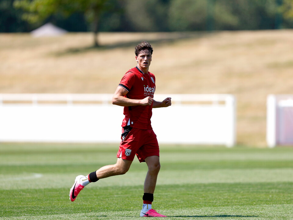 Barney Stewart plays in the red away kit