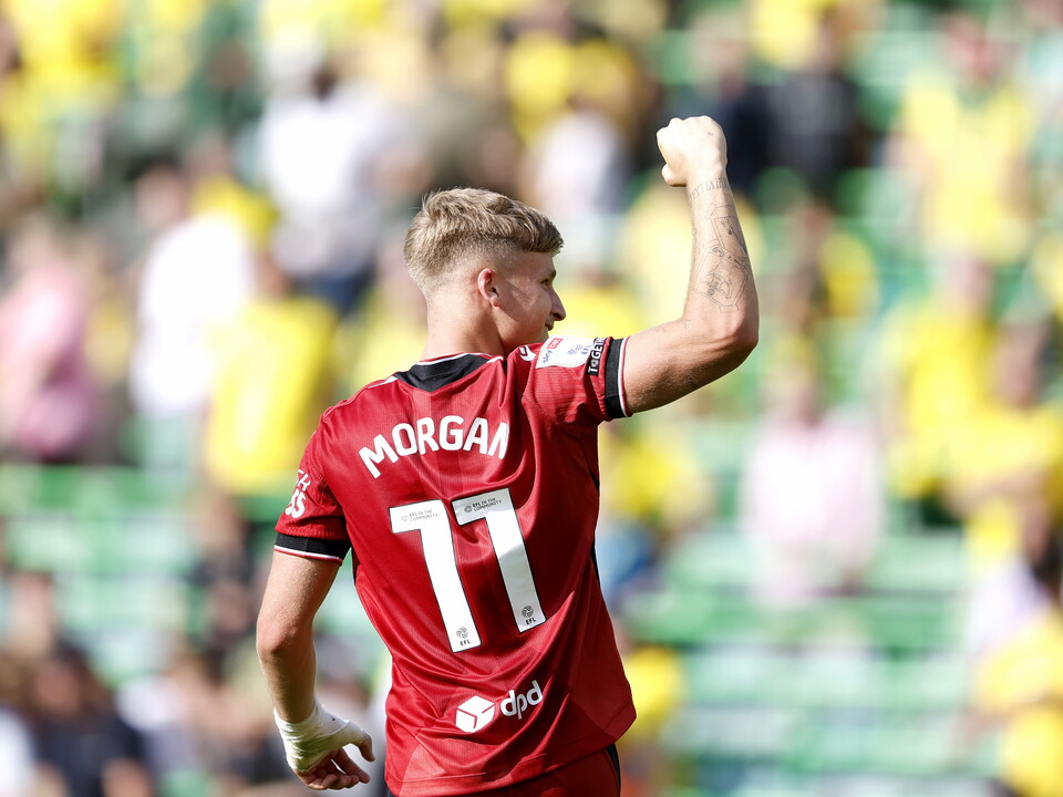 JJ Morgan celebrates his goal at Carrow Road