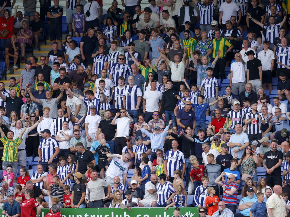 An image of Albion supporters in an away end