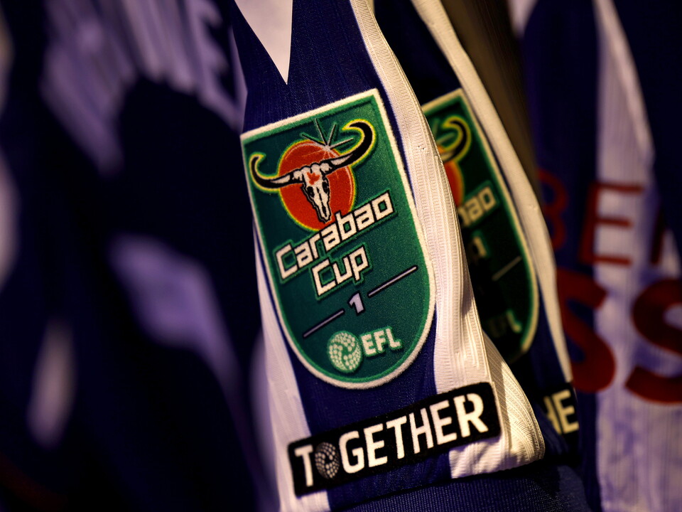 A Carabao Cup logo on a WBA home shirt sleeve