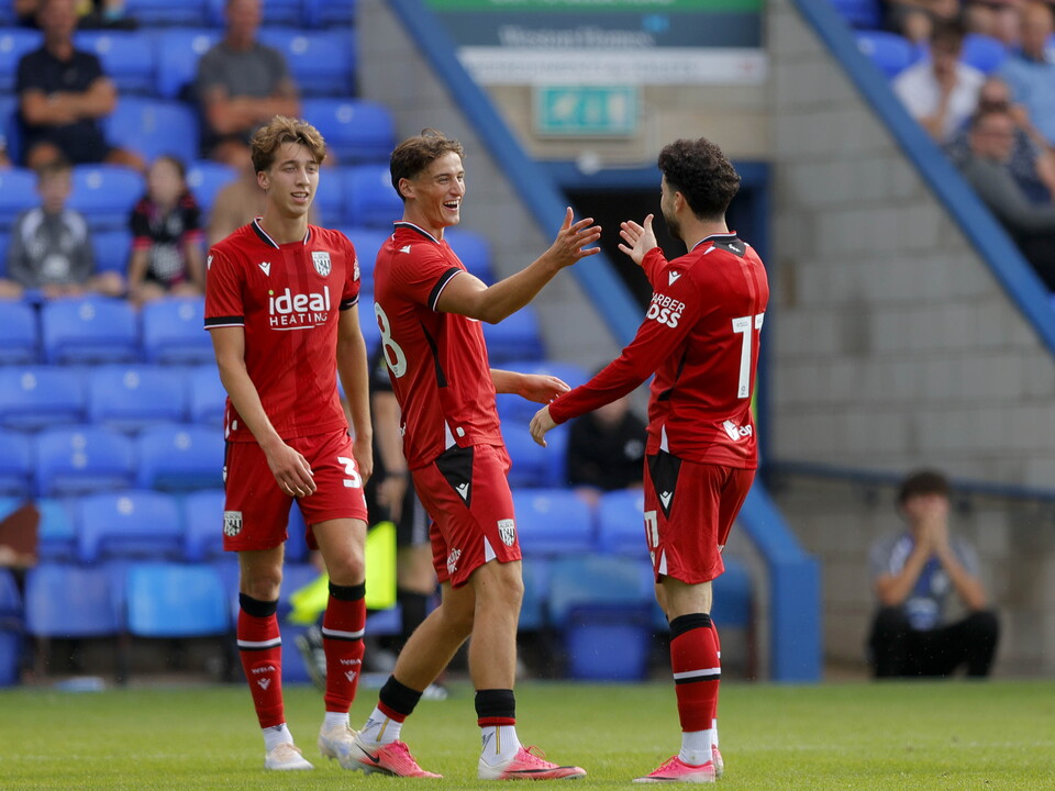 Barney stewart celebrates scoring against Peterborough with Mikey Johnston