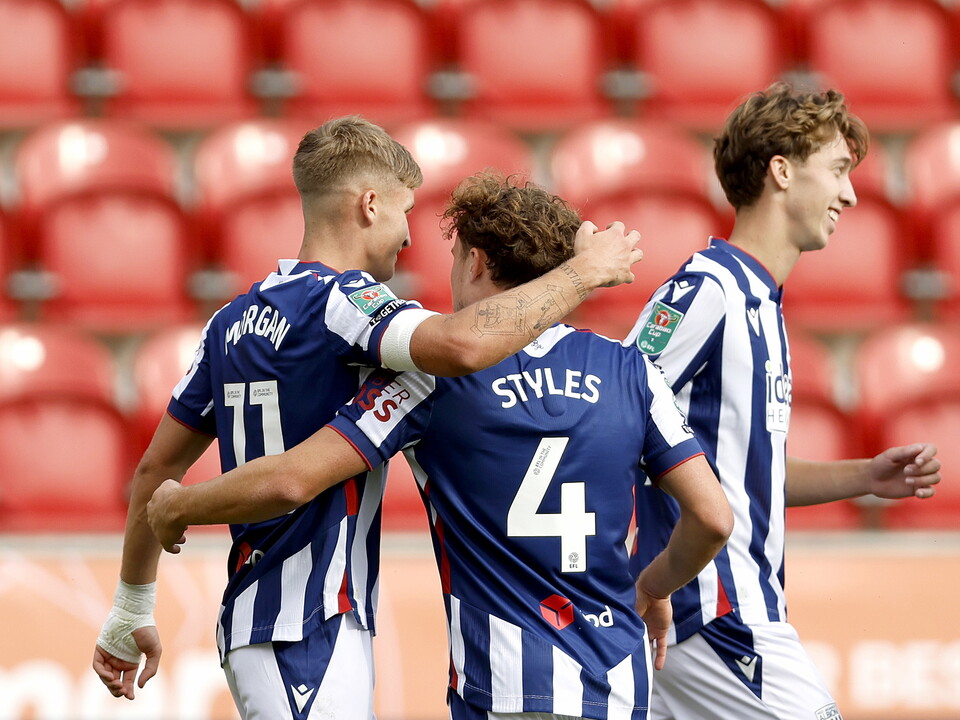 Callum Styles celebrates with JJ Morgan following his goal at Rotherham in the home kit 