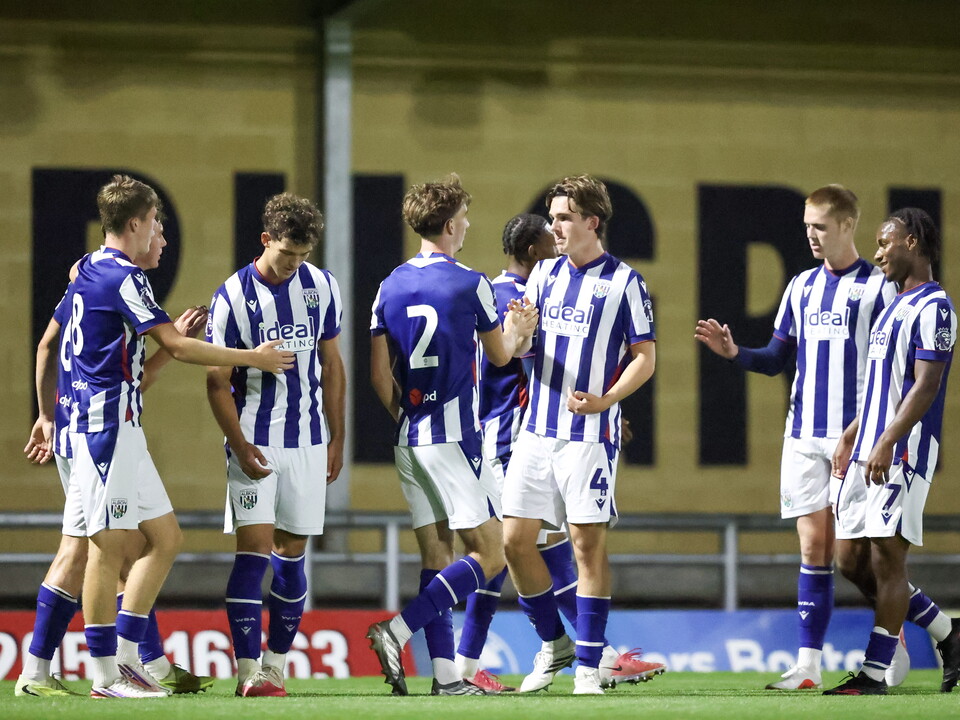 Albion players celebrate.