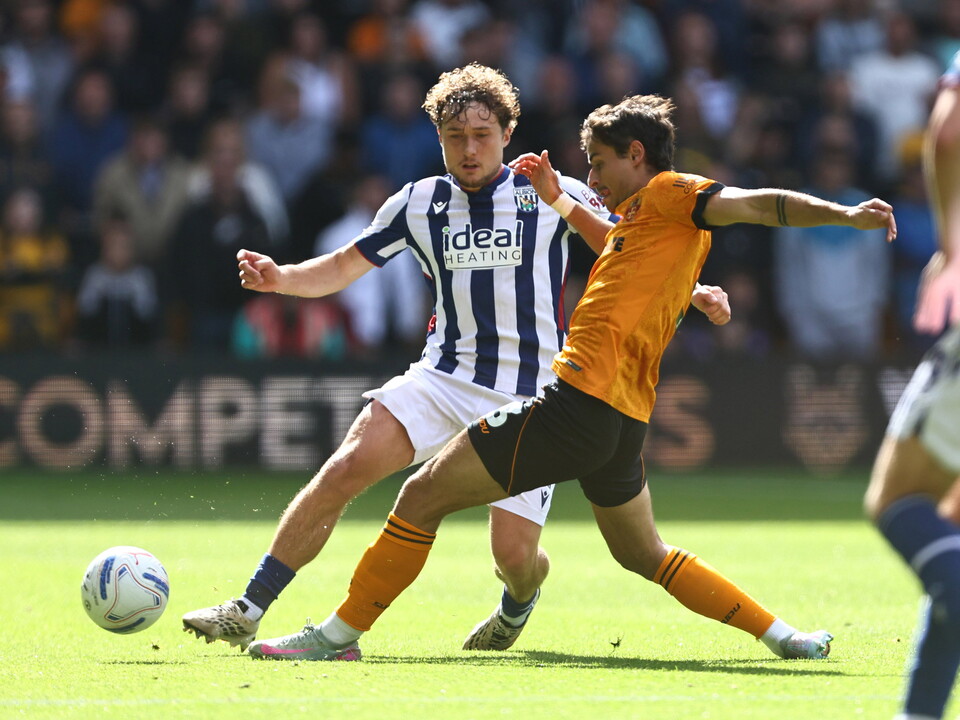 An image of Callum Styles on the ball against Wolves