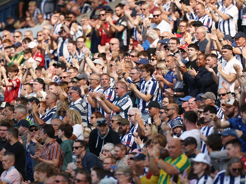 A general view of hundreds of WBA fans clapping at The Hawthorns