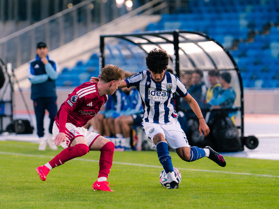 Adam Letlat on the ball against Forest in a PL2 game at the Alexander Stadium 