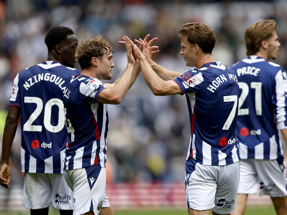 An image of Callum Styles and Felix Horn Myhre celebrating a goal against QPR