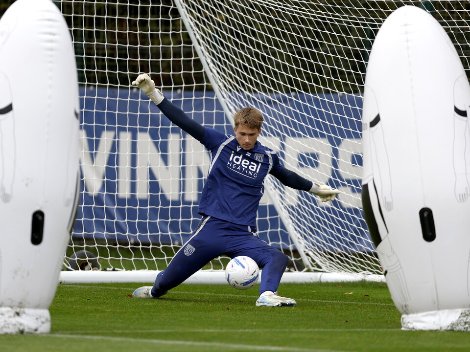 Joe Wallis making a save with his foot in training 