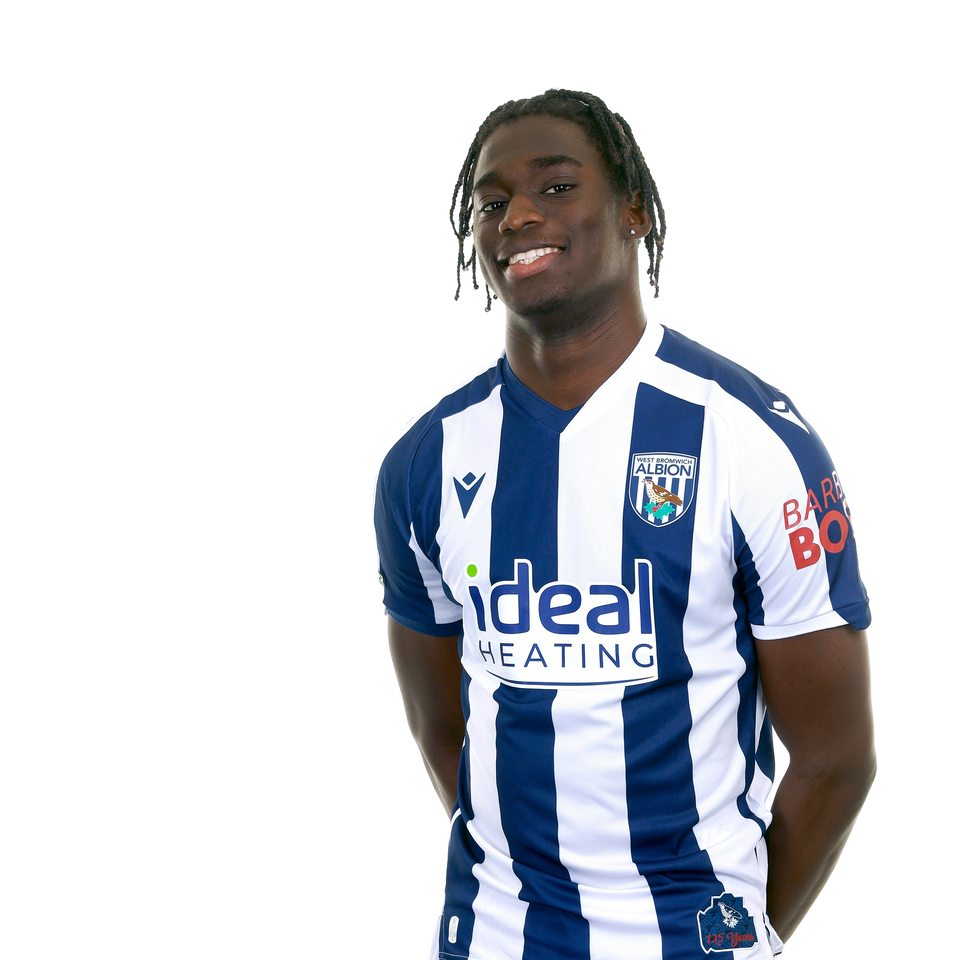 A club headshot of Hindolo Mustapha in the 2025/26 home kit