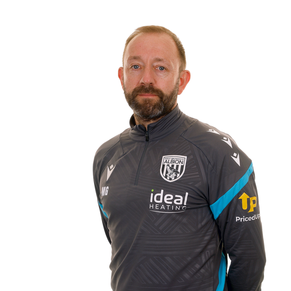 A club headshot of First Team Coach Matt Gill in the 2025/26 training kit