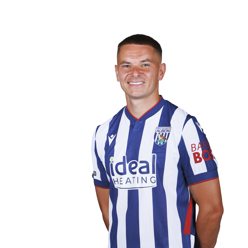 A 2026/27 headshot of Conor Townsend in the home kit