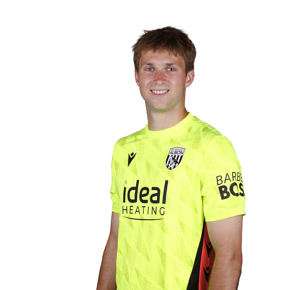 A 2026/27 headshot of Joe Wallis in the home kit