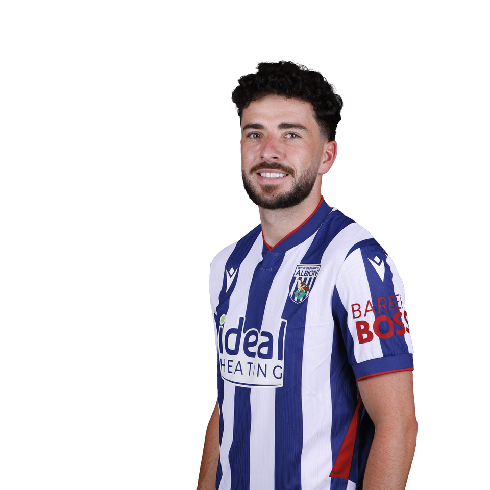 A 2026/27 headshot of Mikey Johnston in the home kit